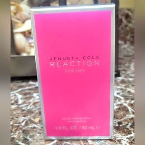 Kenneth Cole Reaction for her. 1oz womens perfume. New in open box.